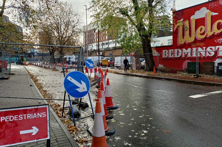 Road with traffic cones and signs